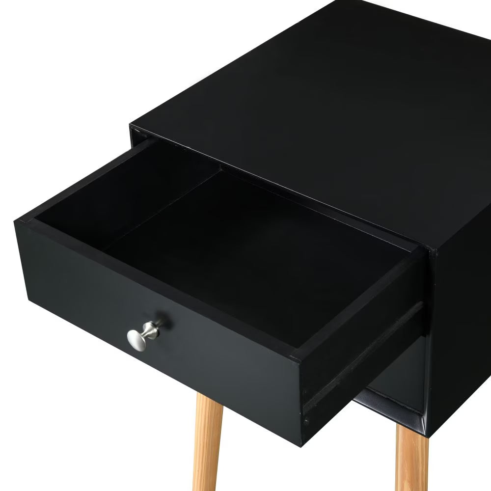 Open drawer of the black nightstand