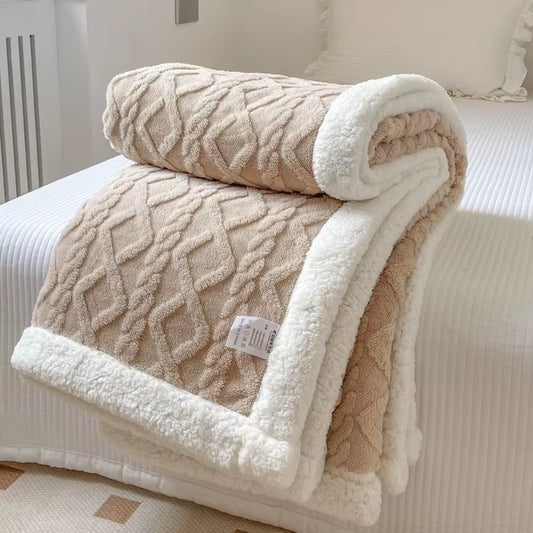 Light coffee cable-textured throw blanket folded, showing the white sherpa border.
