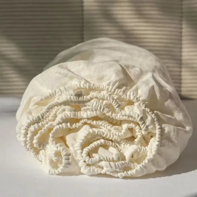 Washed linen fitted sheet with an all-around elastic pocket