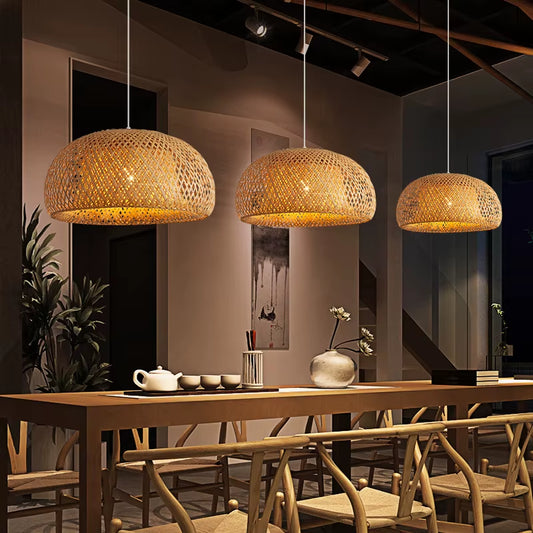 Row of dome bamboo pendant lights above a dining table