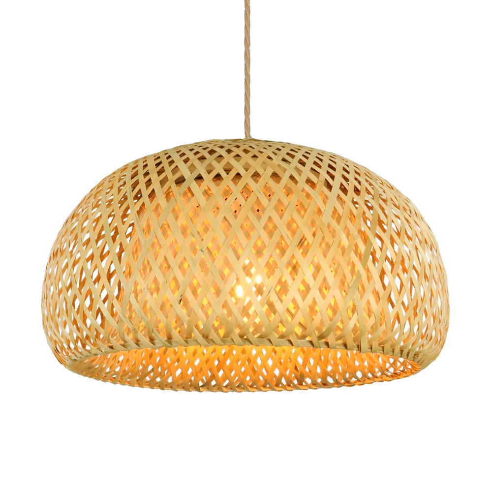 Dome bamboo pendant light with a hand-woven shade, lit