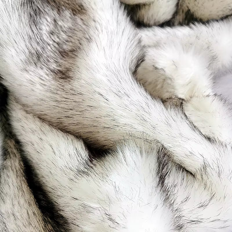 White faux fox fur throw, close view of the long pile