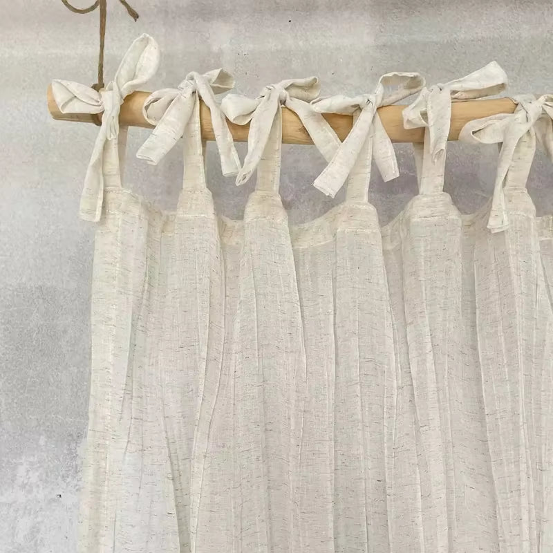 White tie-top curtain panel with a wrinkled linen-look texture