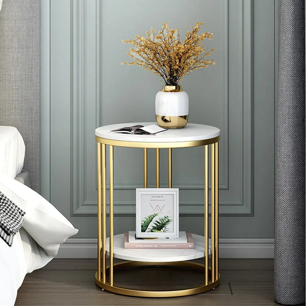 Two-tier round side table with a white stone-look top and gold metal frame