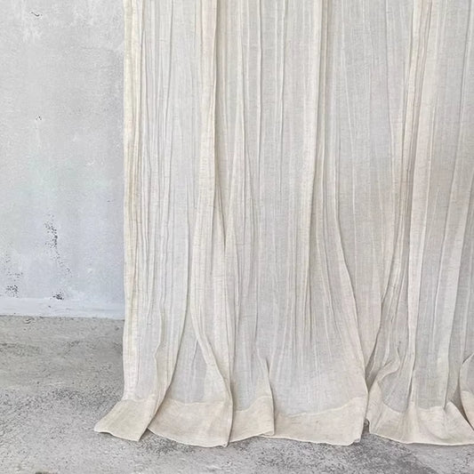 White tie-top curtain panel with a wrinkled linen-look texture