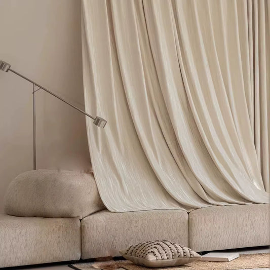 Beige curtain panel with a woven geometric texture
