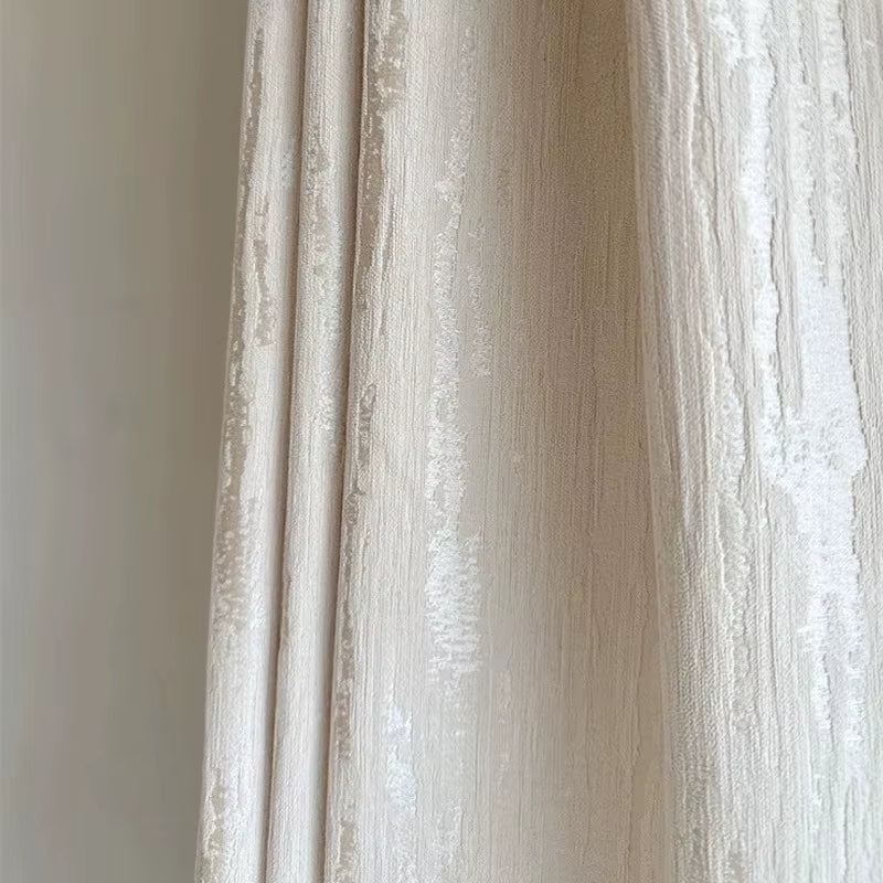 Close view of the beige geometric jacquard weave