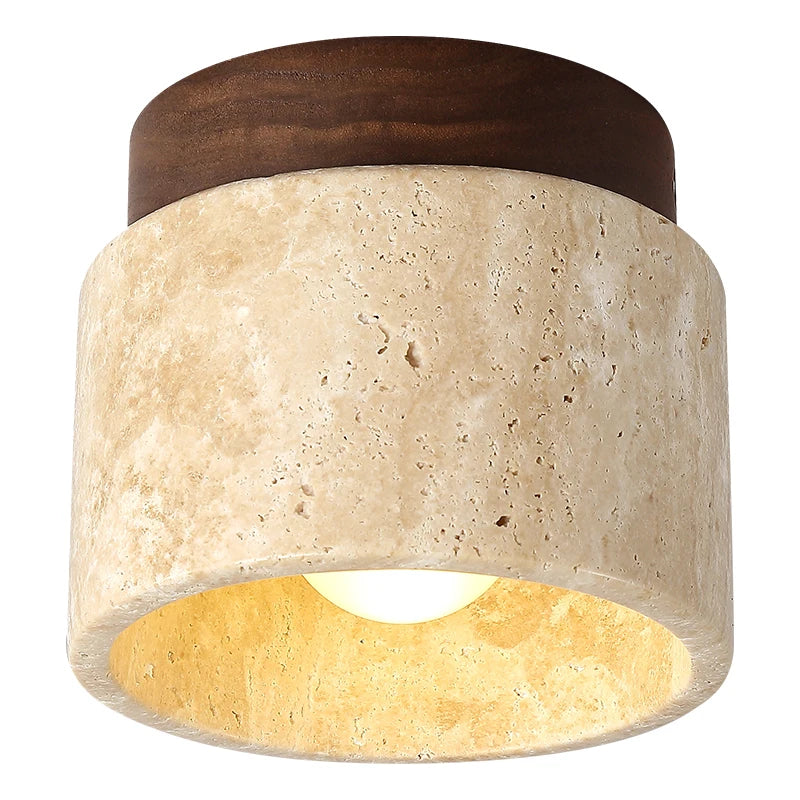 Round stone and wood ceiling light on a white background, lit.