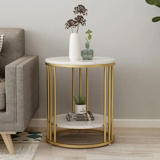 Two-tier round side table with a white stone-look top and gold metal frame