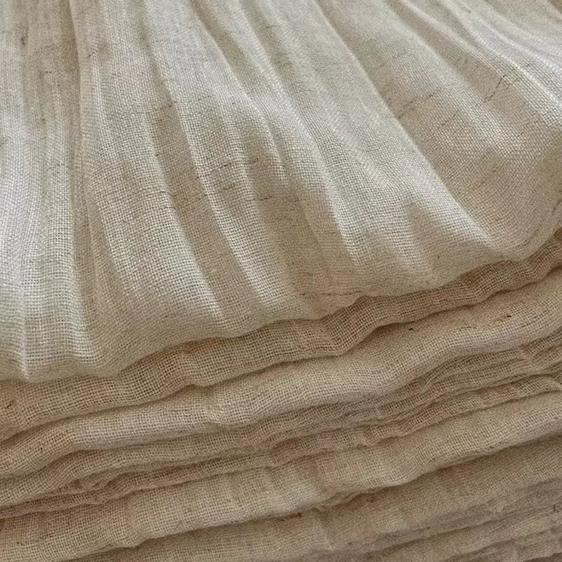 White tie-top curtain panel with a wrinkled linen-look texture