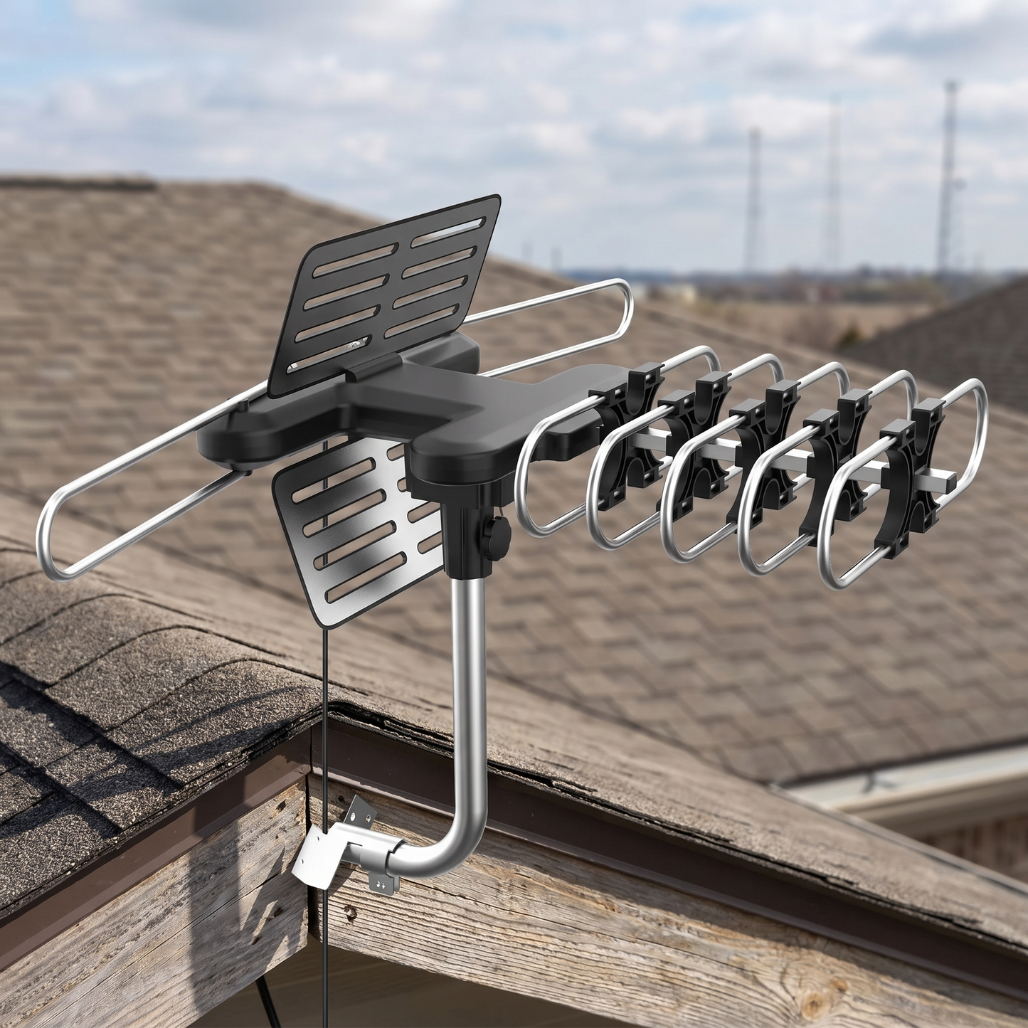 Motorized Outdoor TV Antenna — Installed outdoors at the edge of a shingled house roofline against op — real-scene lifestyle v4